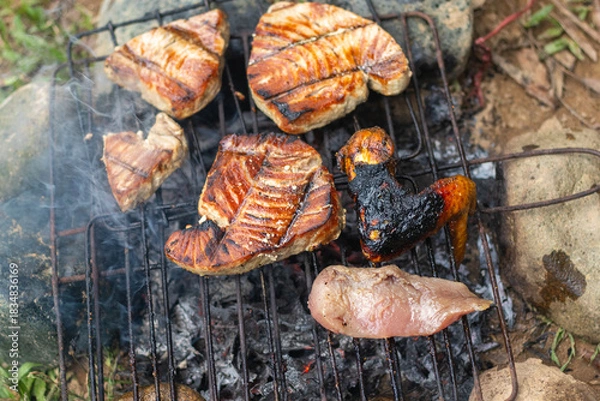 Obraz Assorted Meats Grilling on Metal Grate