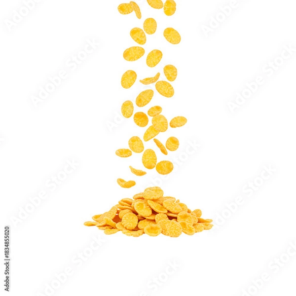 Fototapeta Crispy corn flakes falling into a pile on black background