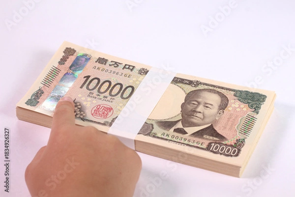 Obraz 一万円札の3Dホログラムを指差す子どもの手