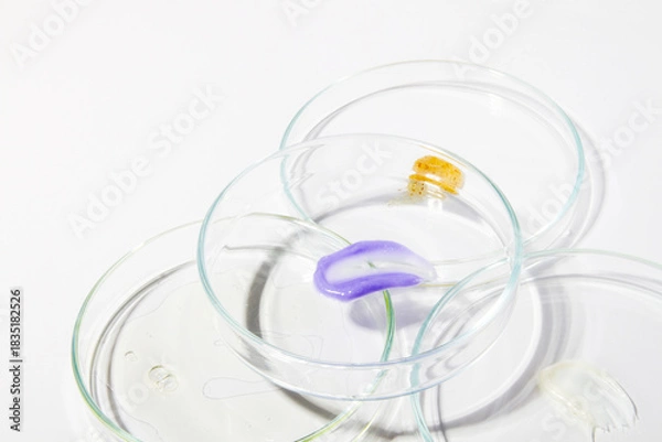 Obraz Multiple Petri dishes with liquid smears on light background