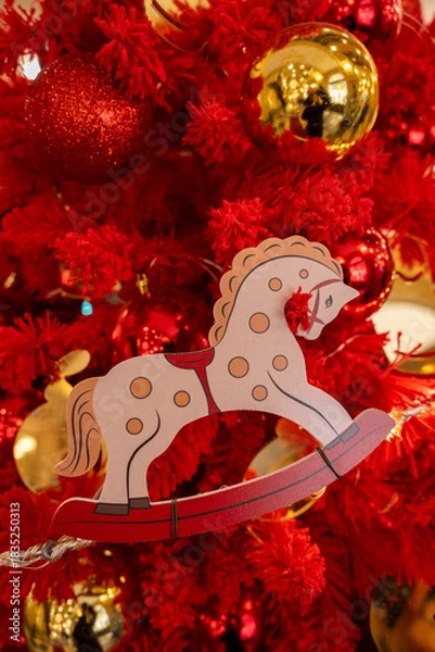 Fototapeta Red Christmas Tree with Rocking Horse Ornament