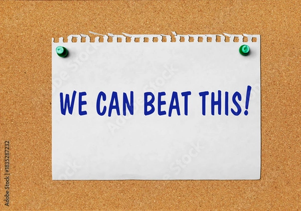 Obraz An advertisement «We can beat this» on a piece of paper attached to a notice board