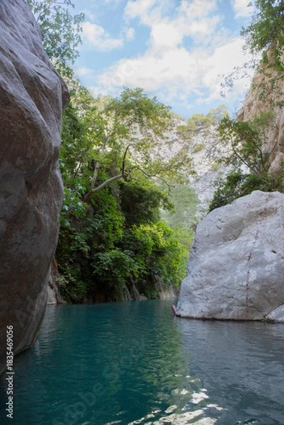 Obraz Stunning narrow Goynuk gorge with majesty of cliffs and turquoise waters. Dramatic rock formation towering over Goynuk canyon waters, Turkey.