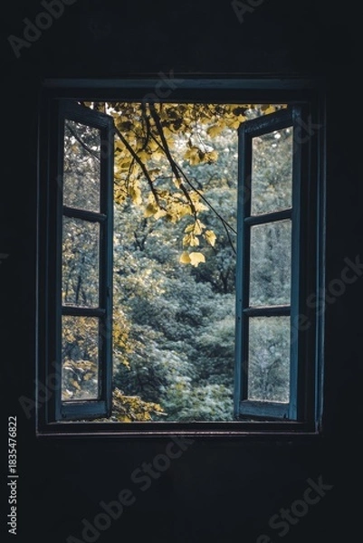 Obraz A dark room leading out to a vibrant autumn scene. The contrast between the interior and exterior creates a striking image.