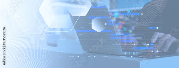 Obraz Digital Workflow Interface Over Laptop in Modern Workspace