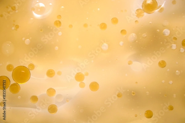 Obraz Abstract Yellow Background with Floating Bubbles and Light Reflection