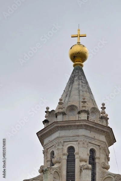 Fototapeta Golden ball and cross that crowns the dome of the Florence Duomo