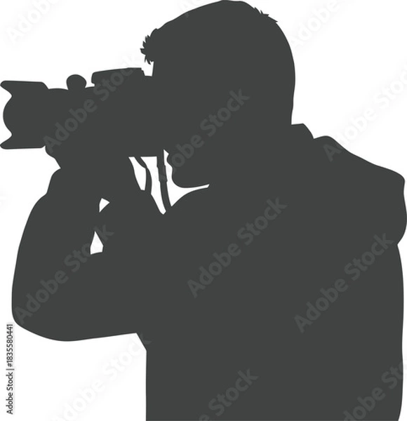 Fototapeta Silhouette of a photographer holding a large camera focusing on a subject isolated on a white backdrop capturing an important moment isolated on white background
