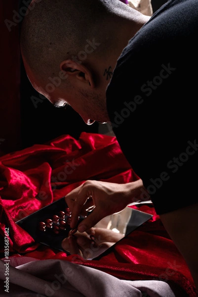 Obraz Man organizing pills set