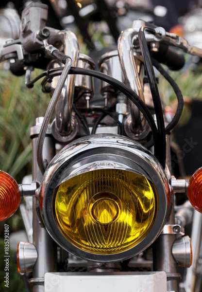 Obraz Close-up of the headlights of a vintage motorcycle.