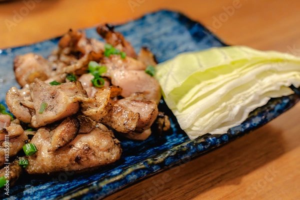 Obraz Grilled chicken with cabbage
