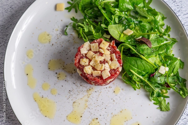 Obraz Beef Carpaccio cold appetizer with parmesan