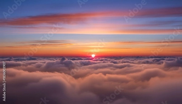 Obraz Dramatic sunset above a vast cloud layer