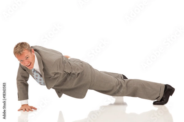 Fototapeta buinessman doing one arm push ups