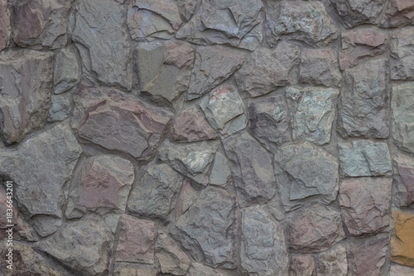 Obraz Finishing the building wall with stone.