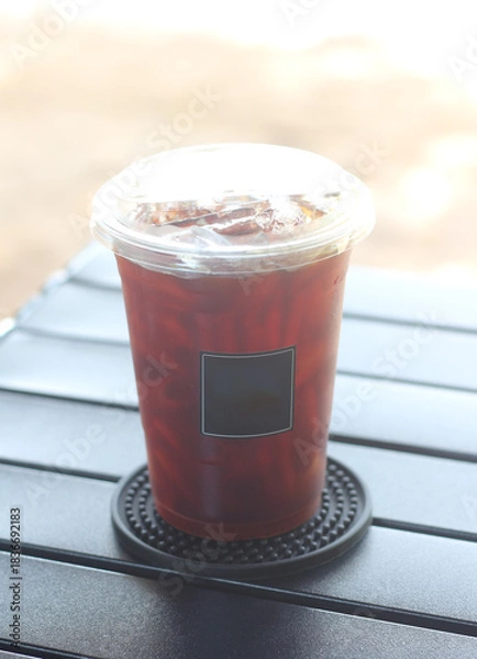 Obraz Iced black coffee on the camping table