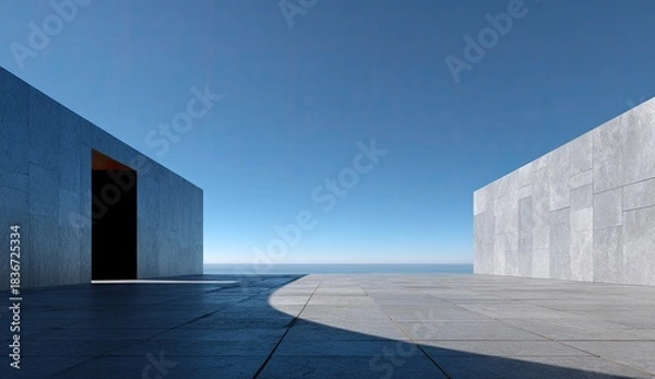 Obraz Modern concrete structures framing a serene ocean vista under a clear sky