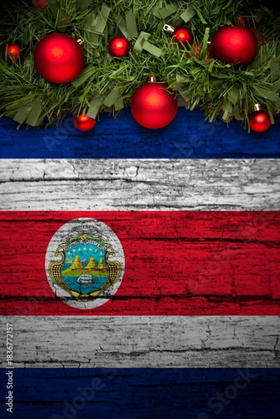 Obraz christmas decoration on wooden background from costa rica