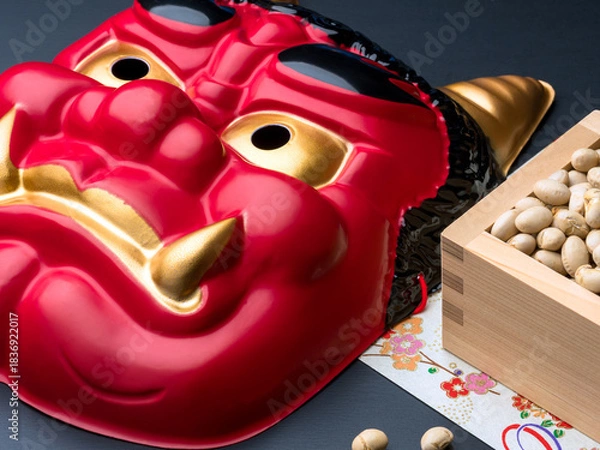 Obraz 赤鬼のお面と節分の豆まきのイメージ
