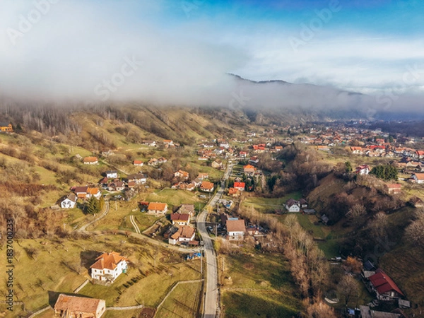 Fototapeta Aerial View of Moeciu de Jos Village in the Carpathian Mountains, Romania