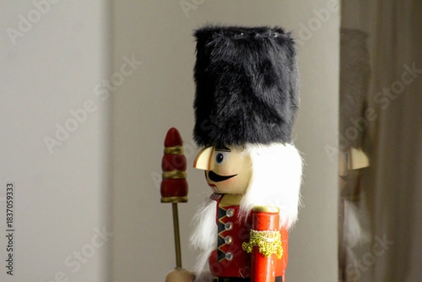 Obraz Image of a nutcracker soldier figurine photographed indoors in Novi Sad on December 6, 2025. Traditional holiday decor captured in soft light.