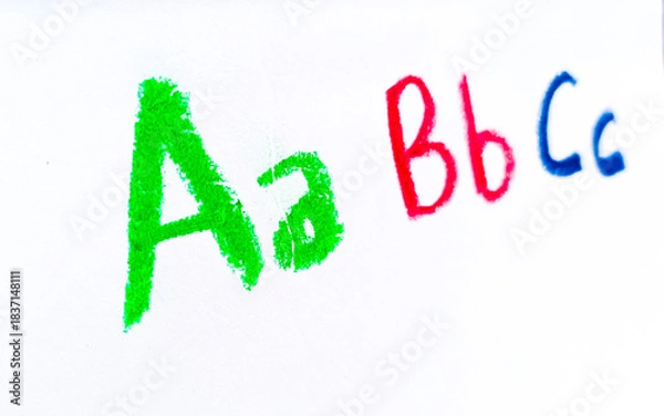 Fototapeta Crayon alphabet isolated over white background, Letters abcd. Colorful hand drawing crayon texture