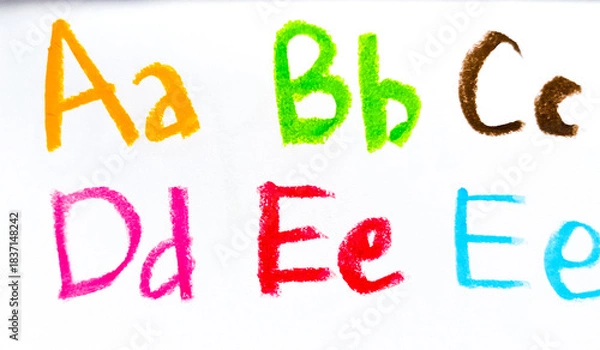 Fototapeta Crayon alphabet isolated over white background, Letters abcd. Colorful hand drawing crayon texture