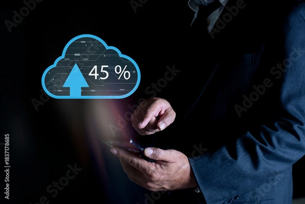 Obraz Businessman using smartphone with arrows and percent going up backing up data on cloud technology. Global cloud computing, digital interface and data processing concept