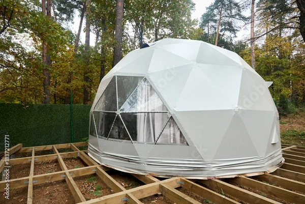 Fototapeta Geodesic domes for glamping and camping, thin-shell structure lattice shell based on geodesic polyhedron. Glamping is glamorous and camping, style of camping with amenities and resort style services.