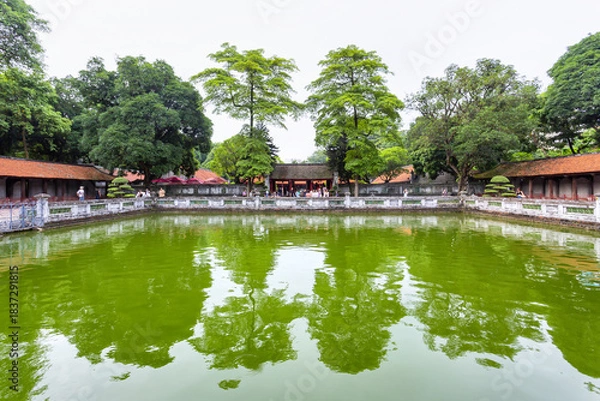 Obraz View across the Thien Quang Tinh pond inside the historic Temple of Literature in Hanoi