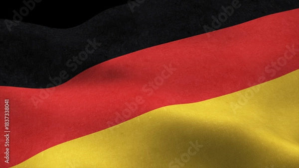Obraz German flag fluttering in the wind isolated on black background