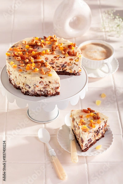 Obraz Tasty cheesecake with walnuts and caramel glaze.