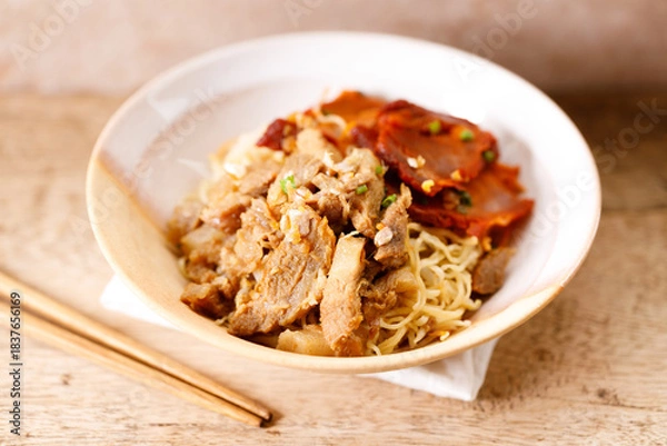 Obraz Egg Noodles with meat in bowl with chopsticks