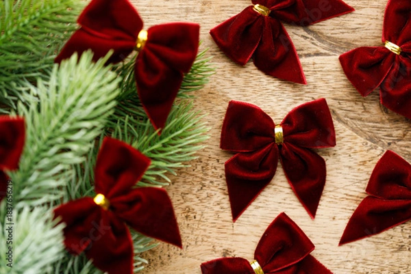 Obraz Red ribbons with pine branches, Christmas tree concept.