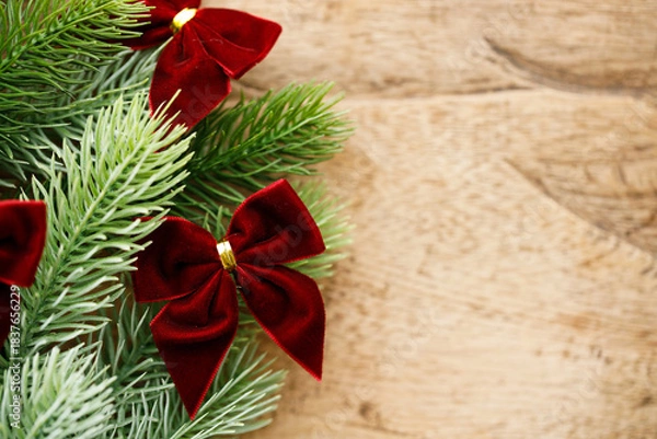 Obraz Red ribbons with pine branches, Christmas tree concept.