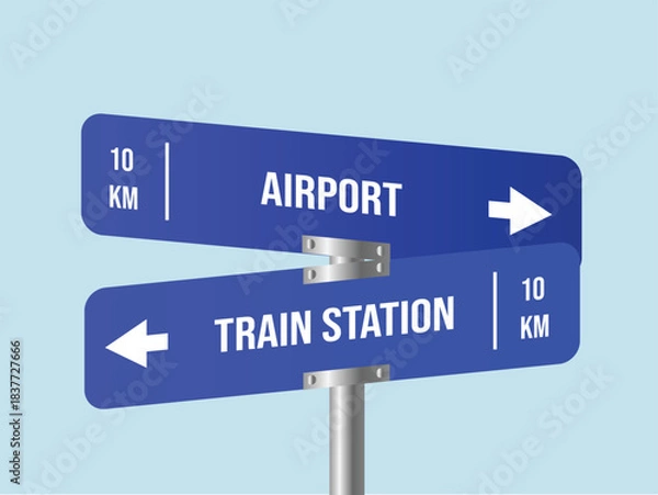 Fototapeta Signage Dilemma: A straightforward signpost presents travelers with a decisive choice: continue to the airport or veer toward the train station. Directional cues and distance indicators guide the way.