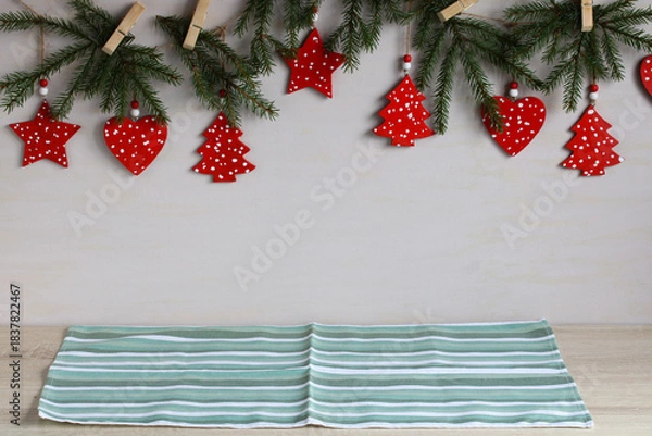 Fototapeta Christmas branches with rustic ornaments and empty space