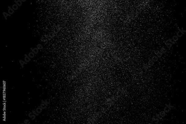 Obraz The falling white snow on a black background