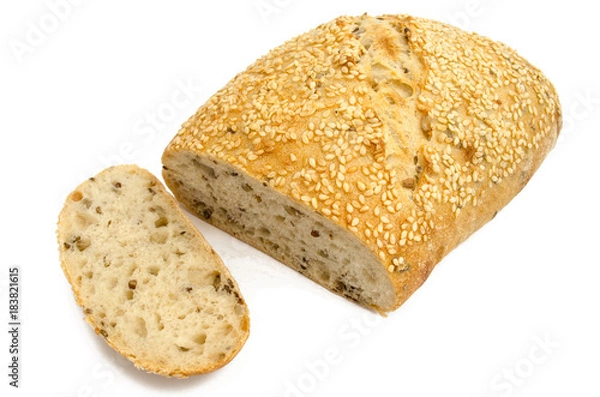 Fototapeta Sesame bread with different seeds and sliced isolated on white background