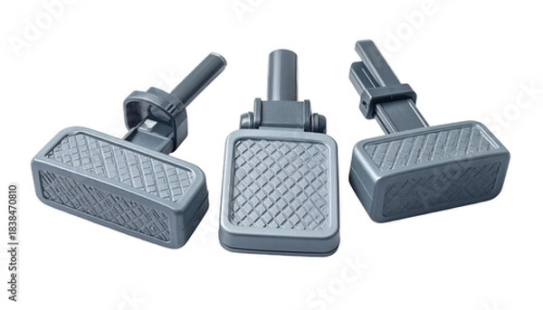 Obraz Three identical, gray foot pedals with textured treads, angled against a black background
