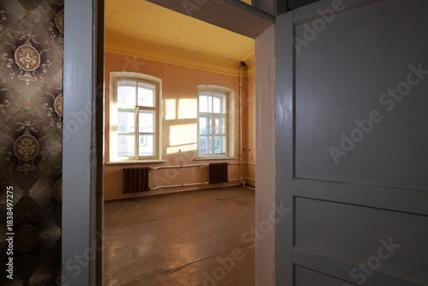 Fototapeta empty room with a window. view through opened door