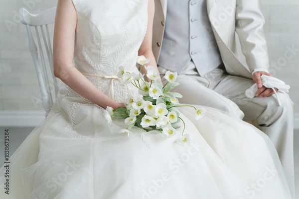 Obraz ドレス姿の新婦とタキシード姿の新郎　ウエディングイメージ