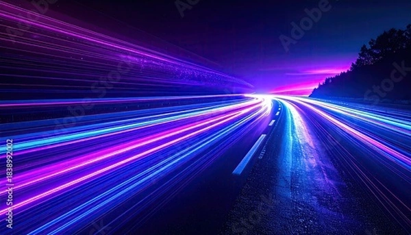 Obraz Long exposure captures vibrant streaks of light along a highway at dusk