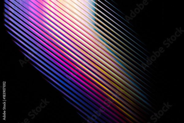 Fototapeta Abstract diagonal lines with vibrant gradient colors and subtle light reflections on a dark background