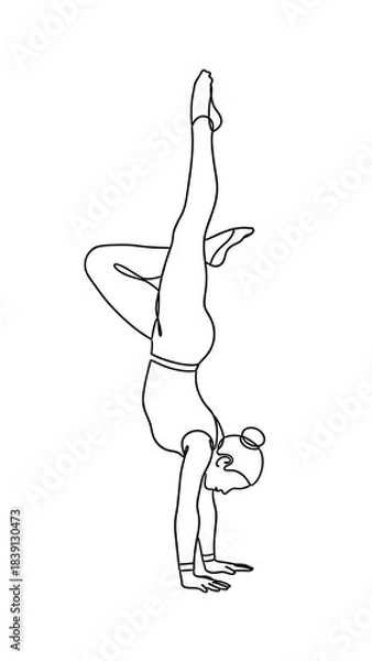 Fototapeta A graceful acrobat executing a handstand pose, a testament to agility and strength. 