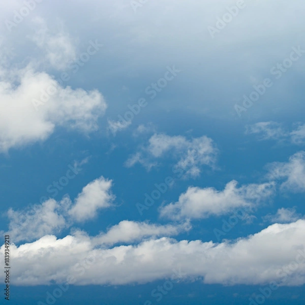 Obraz Tranquil Summer Sky with White Puffy Clouds and Copy Space