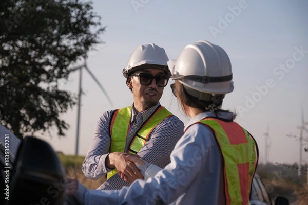Fototapeta Engineer working at Wind turbine fields