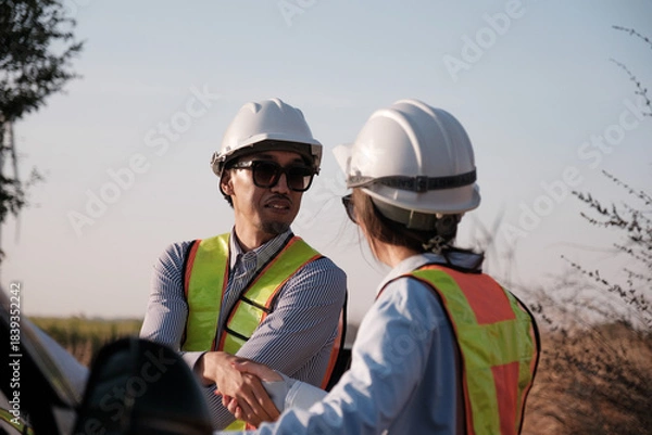 Fototapeta Engineer working at Wind turbine fields