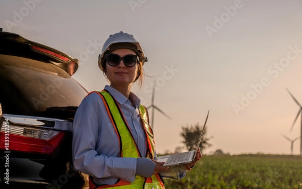 Fototapeta Engineer working at Wind turbine fields