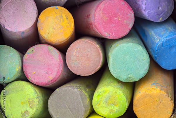 Obraz Close-up of stacked colorful chalk sticks showing various bright hues with textured surfaces in a tightly packed arrangement